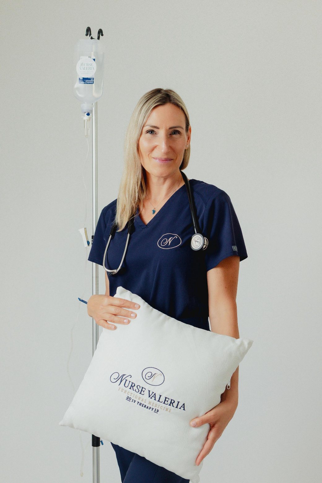 Valeria, Canadian Registered Nurse, with IV therapy and her Nurse Valeria branding
